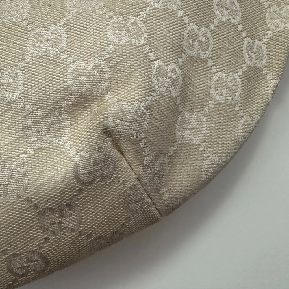 Gucci GG Canvas Cream Hobo Bag with Monogram Print and Leather Trim